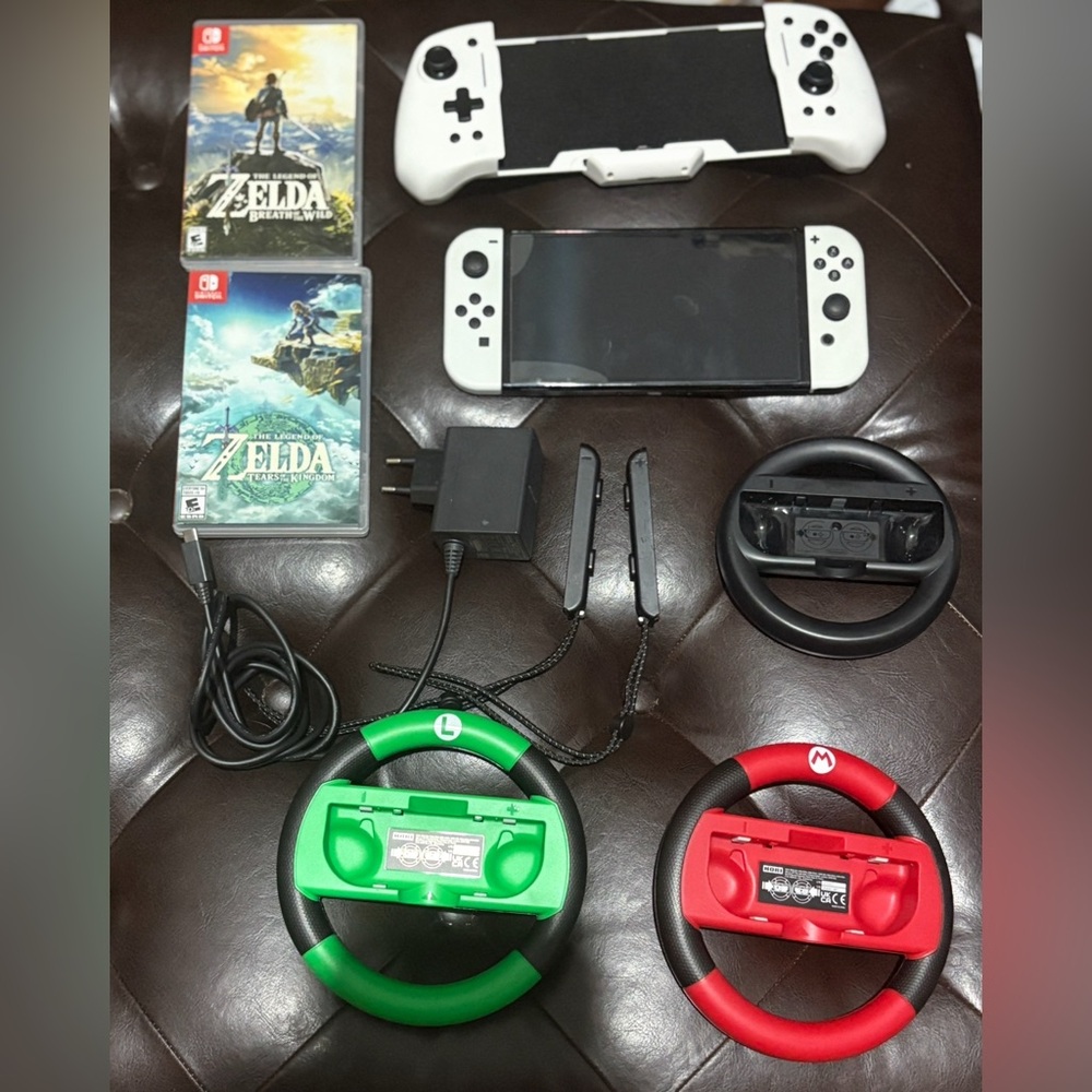 Nintendo Switch OLED with Black, White, Red, Green Joy-Con Wheels